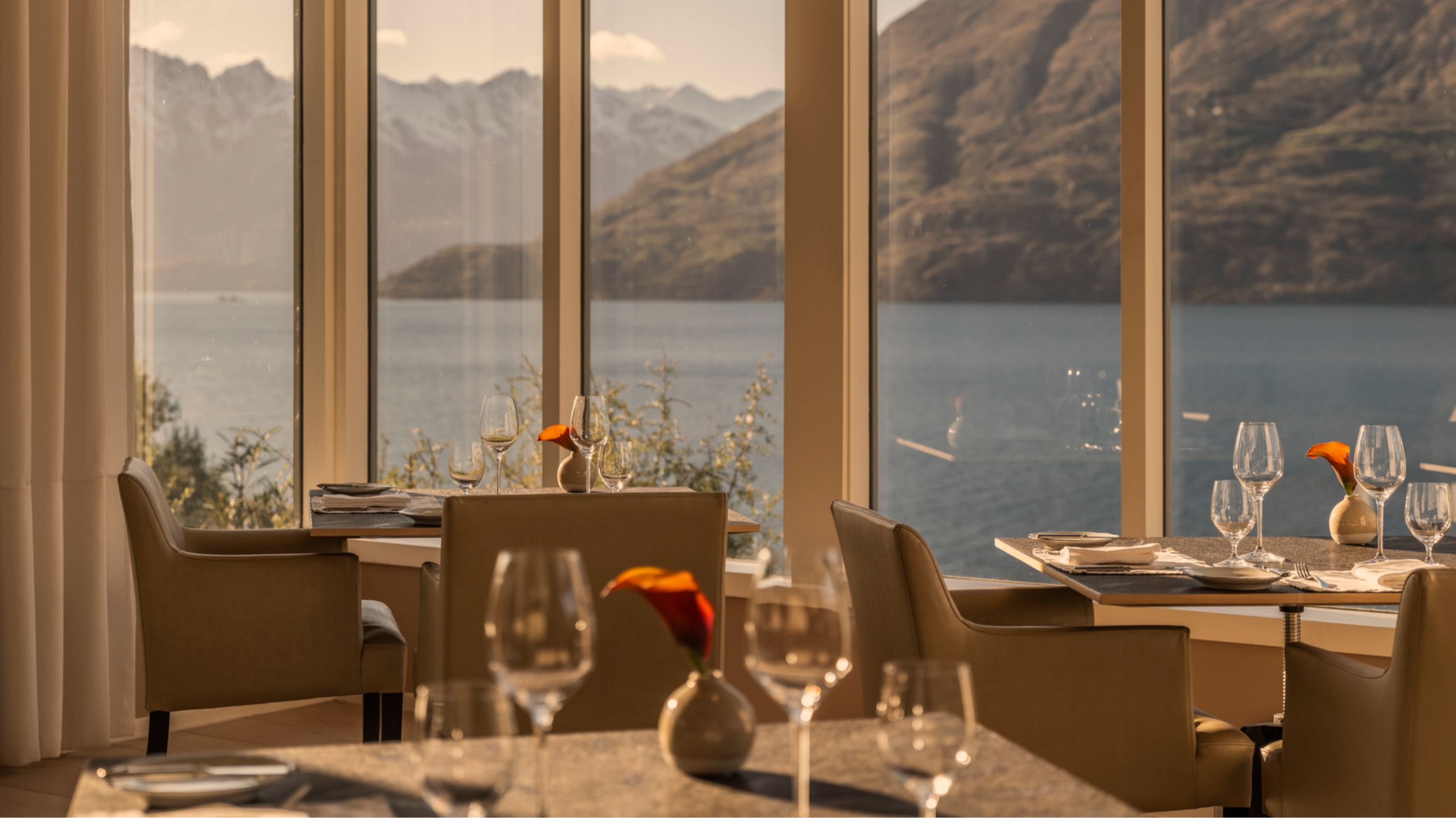 Main Lodge Main Dining Room with lake and mountains view